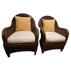 A Pair of 1980s Rattan and Rush Lounge Chairs with Ottoman Set