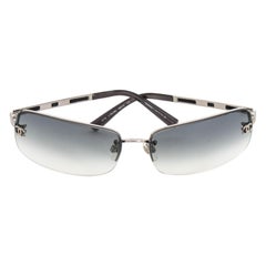 A Pair of 1990s Vintage Chanel  Silver Frame and Logo Detail Sunglasses