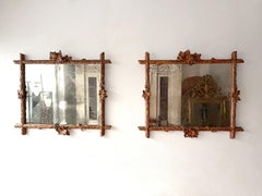 A Pair of 19th C Black Forest Folk Art Carved Vine Mirrors