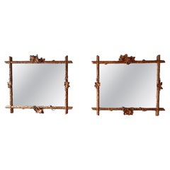 A Pair of 19th C Black Forest Folk Art Carved Vine Mirrors