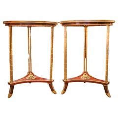 A  paire de  Tables de guéridon en acajou continental et bronze doré du 19e siècle.