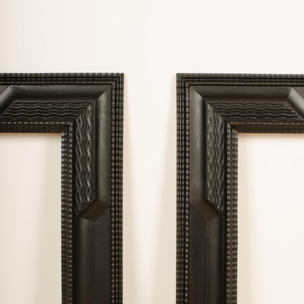 A pair of 19th C Dutch Style Ebonized Frame or Mirror with Blackened Carved Wood In Good Condition In Philadelphia, PA