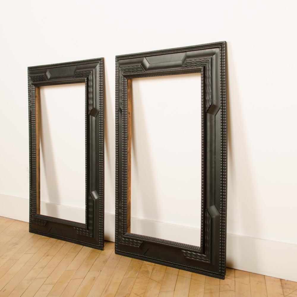 A pair of 19th C Dutch Style Ebonized Frame or Mirror with Blackened Carved Wood 1