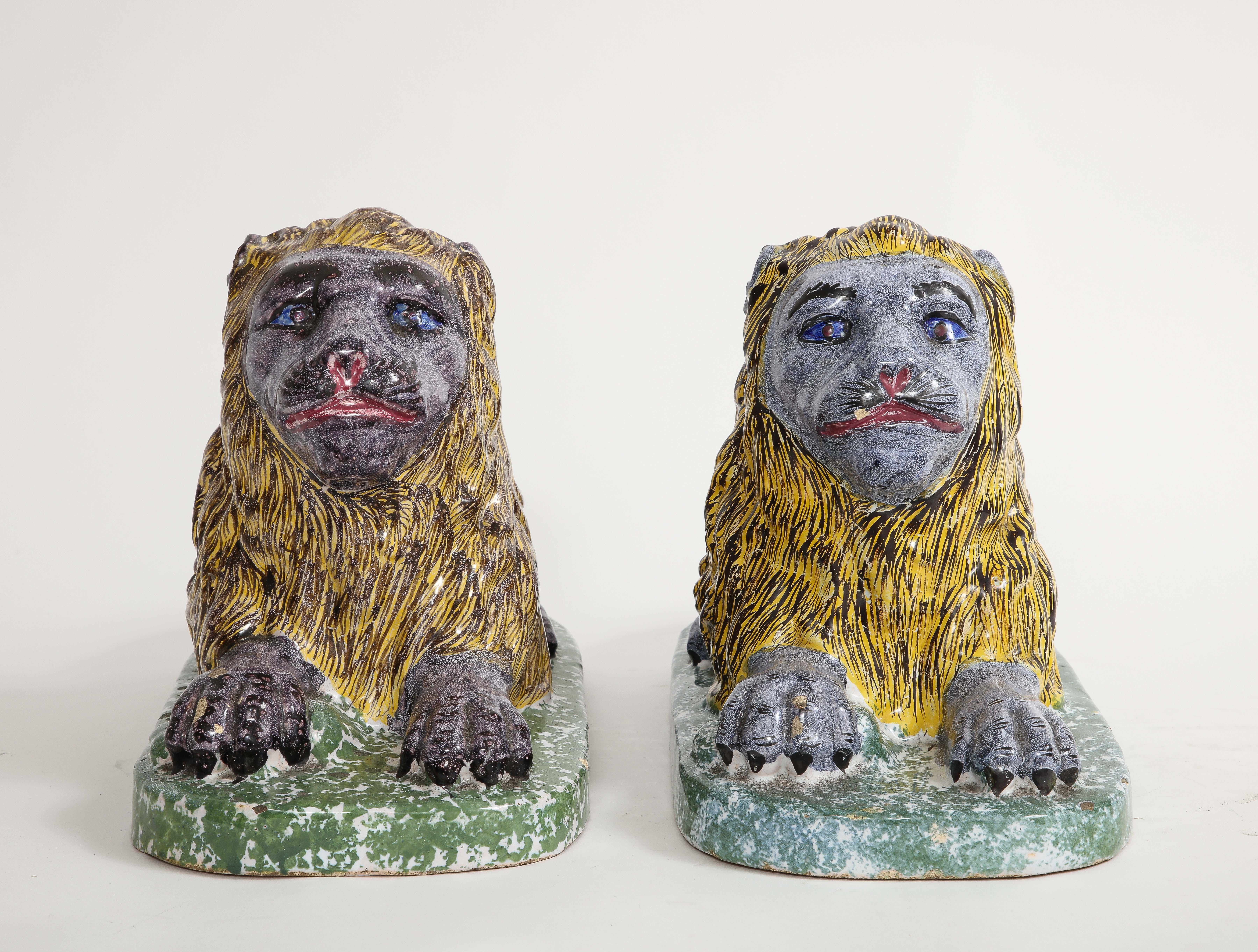 Pair of 19th Century French Majolica/Fiance Models of Lions Perched on Stands In Good Condition For Sale In New York, NY