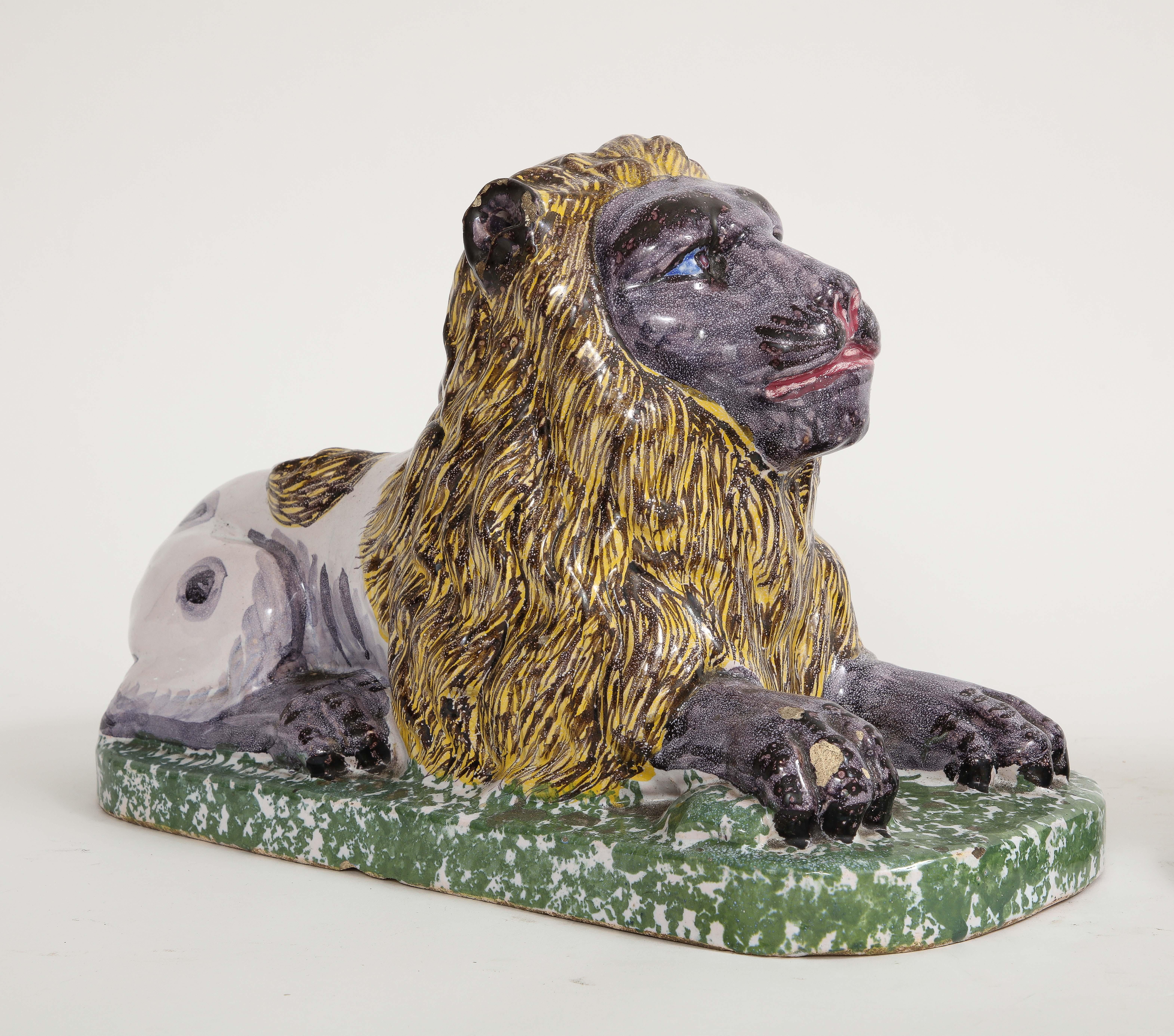 Ceramic Pair of 19th Century French Majolica/Fiance Models of Lions Perched on Stands For Sale