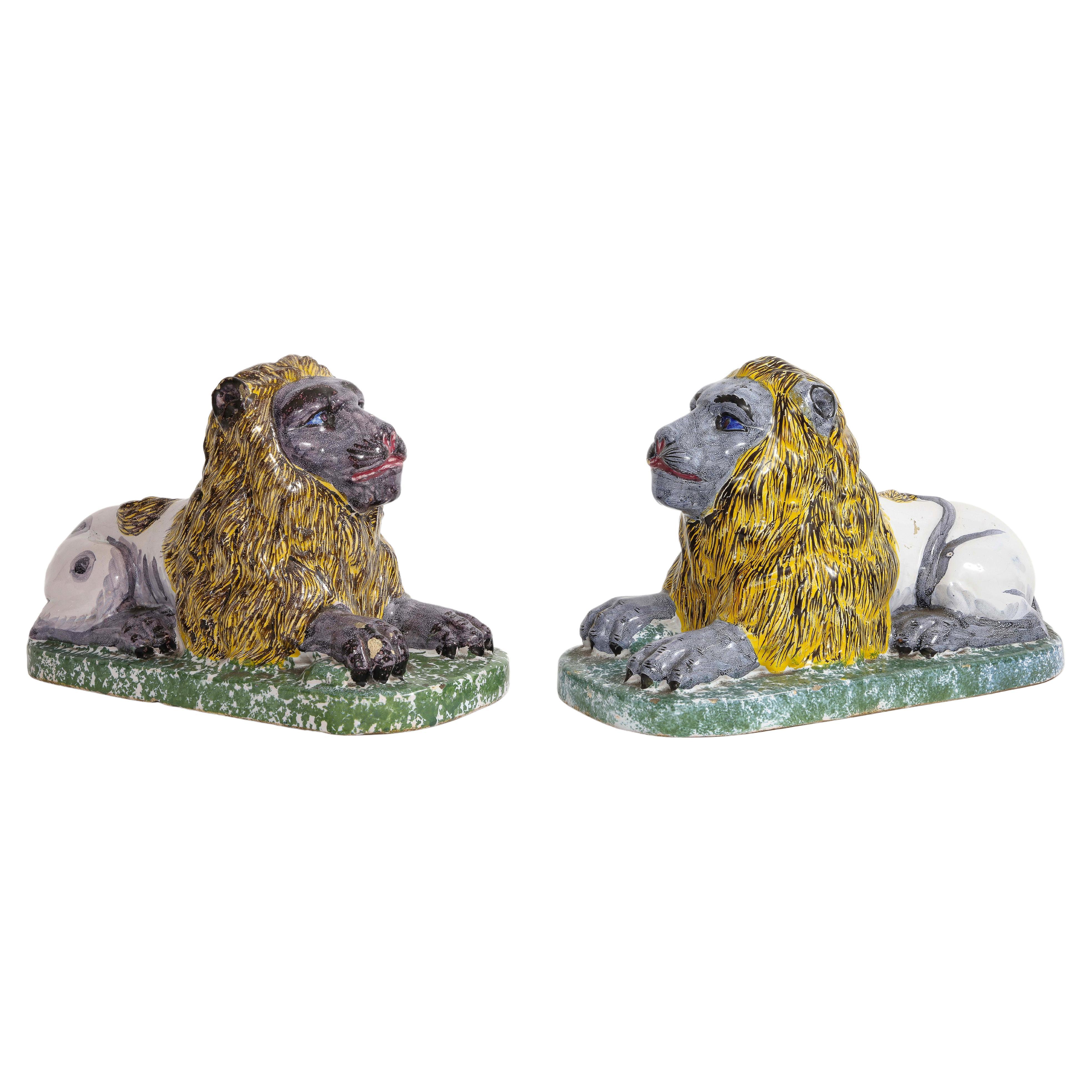 Pair of 19th Century French Majolica/Fiance Models of Lions Perched on Stands For Sale