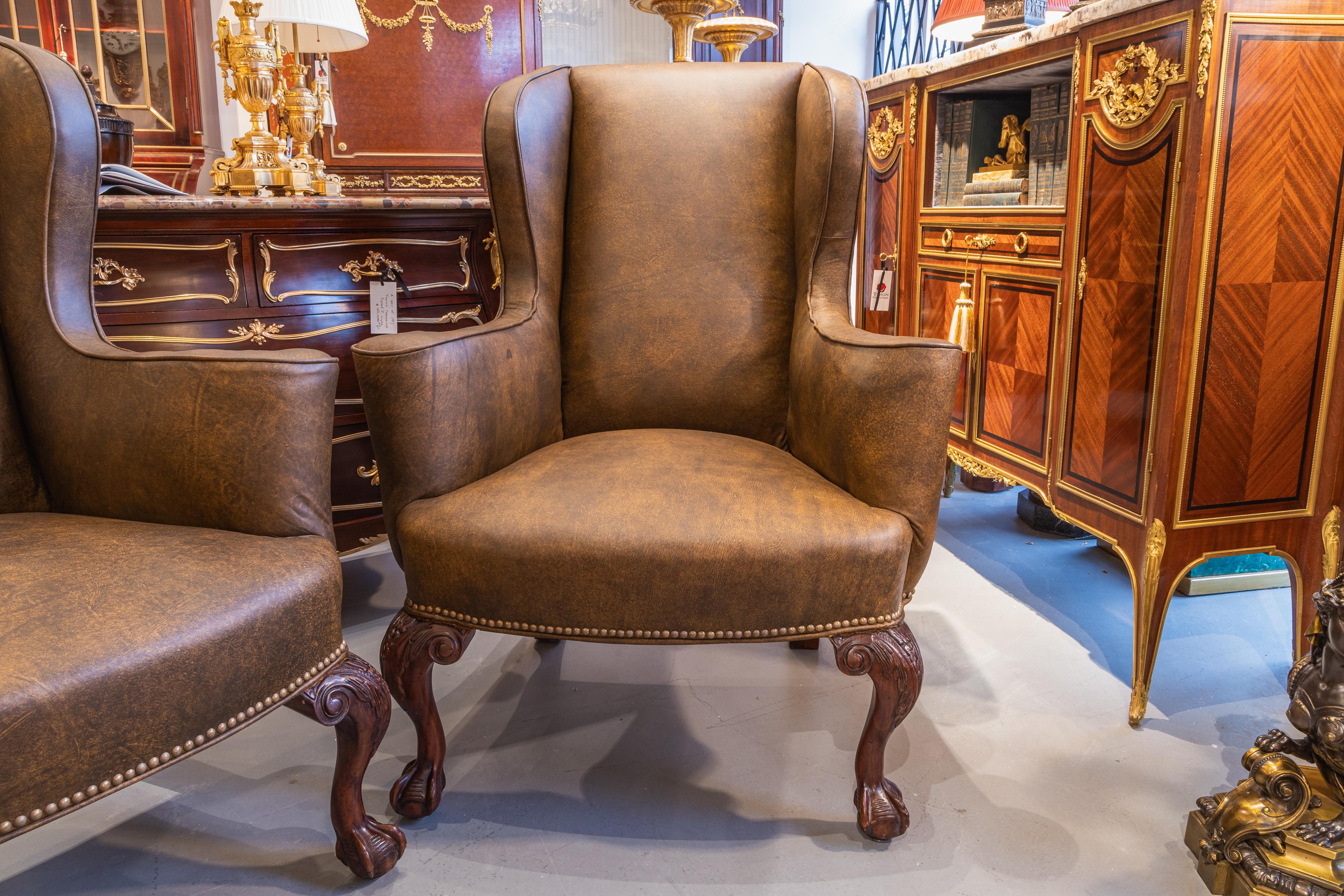 George I A  pair of 19th c George 1 style mahogany English wingchairs . Ball and claw  For Sale