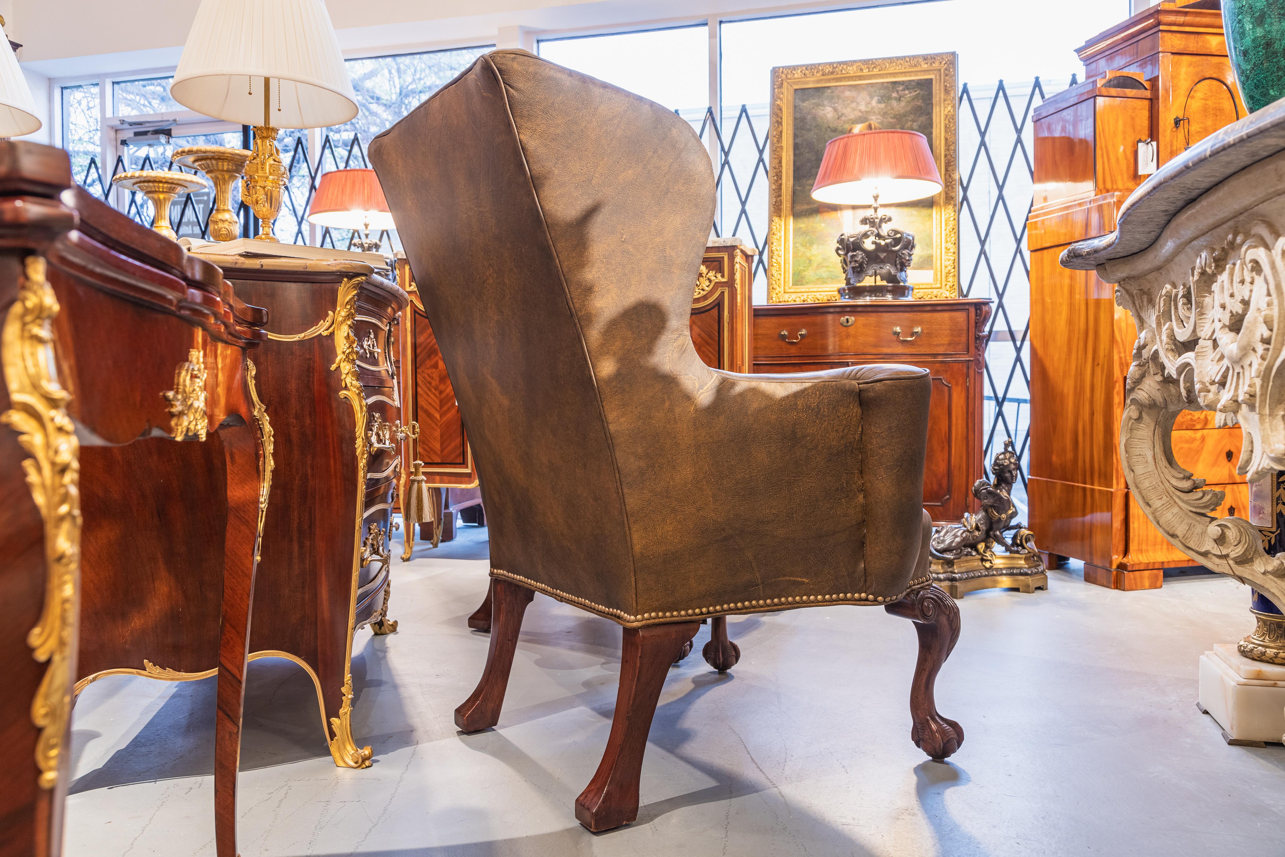 A  pair of 19th c George 1 style mahogany English wingchairs . Ball and claw  In Good Condition For Sale In Dallas, TX