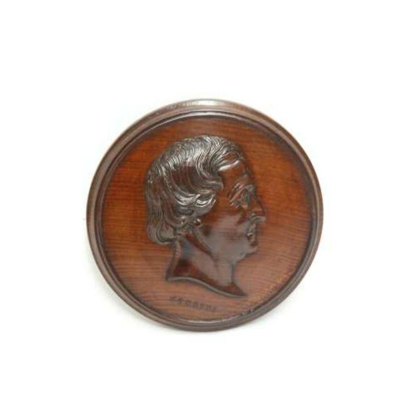 A pair of 19th c mahogany portrait wall plaques The Composers Rossini And Auber

Remarkable exhibition quality carving into solid turned rich dense mahogany plaques. The two portraits have carved titles below, Rossini and Auber. Each one depicts a