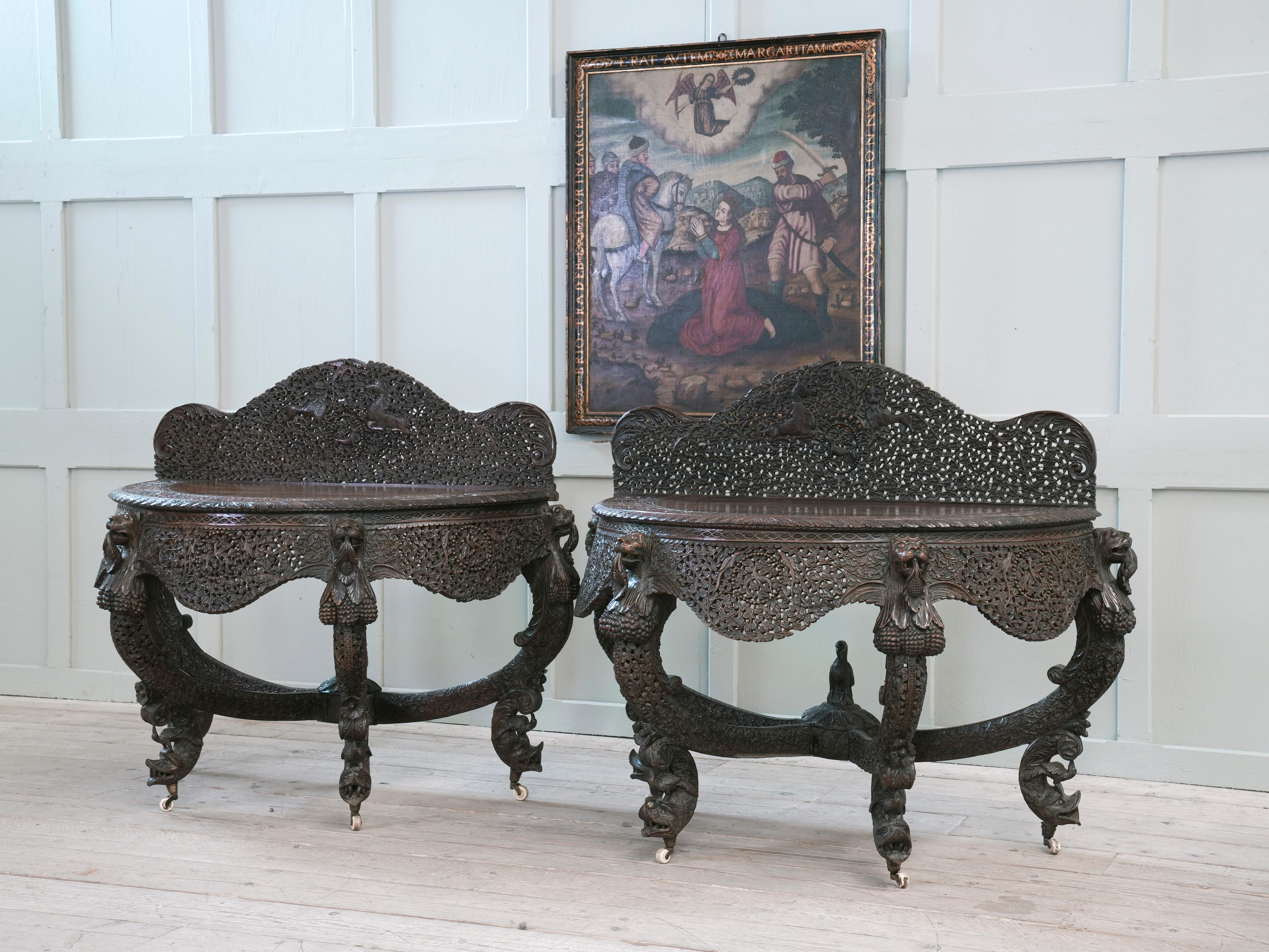 A handed pair of Anglo Indian rosewood console tables.

Superbly carved, excellent colour.

A very scarce examples and in superb condition throughout.

Circa 1870.

H:114 W:135 D:65 CM.

H:44.8 W:53 D:25.5 INCHES.

Price is for the