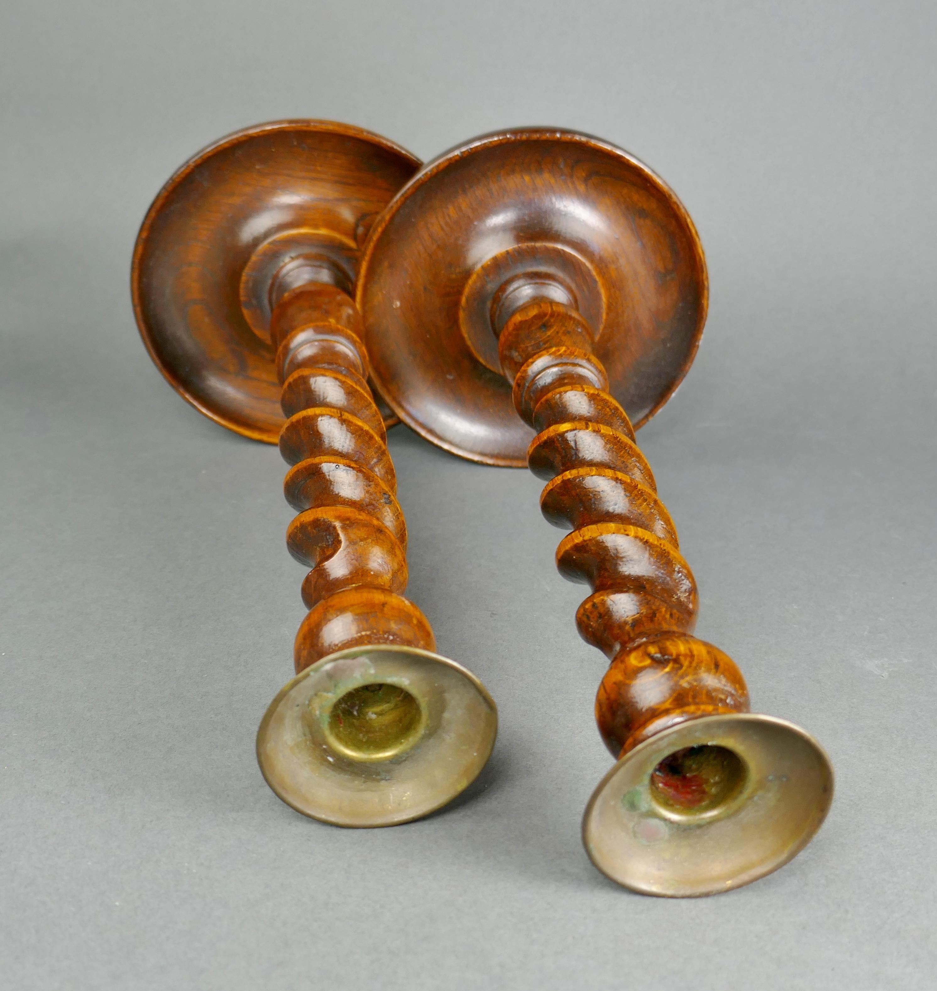A Pair Of 19th Century Barley Twist Oak & Brass Candlestick In Fair Condition In San Juan Capistrano, CA
