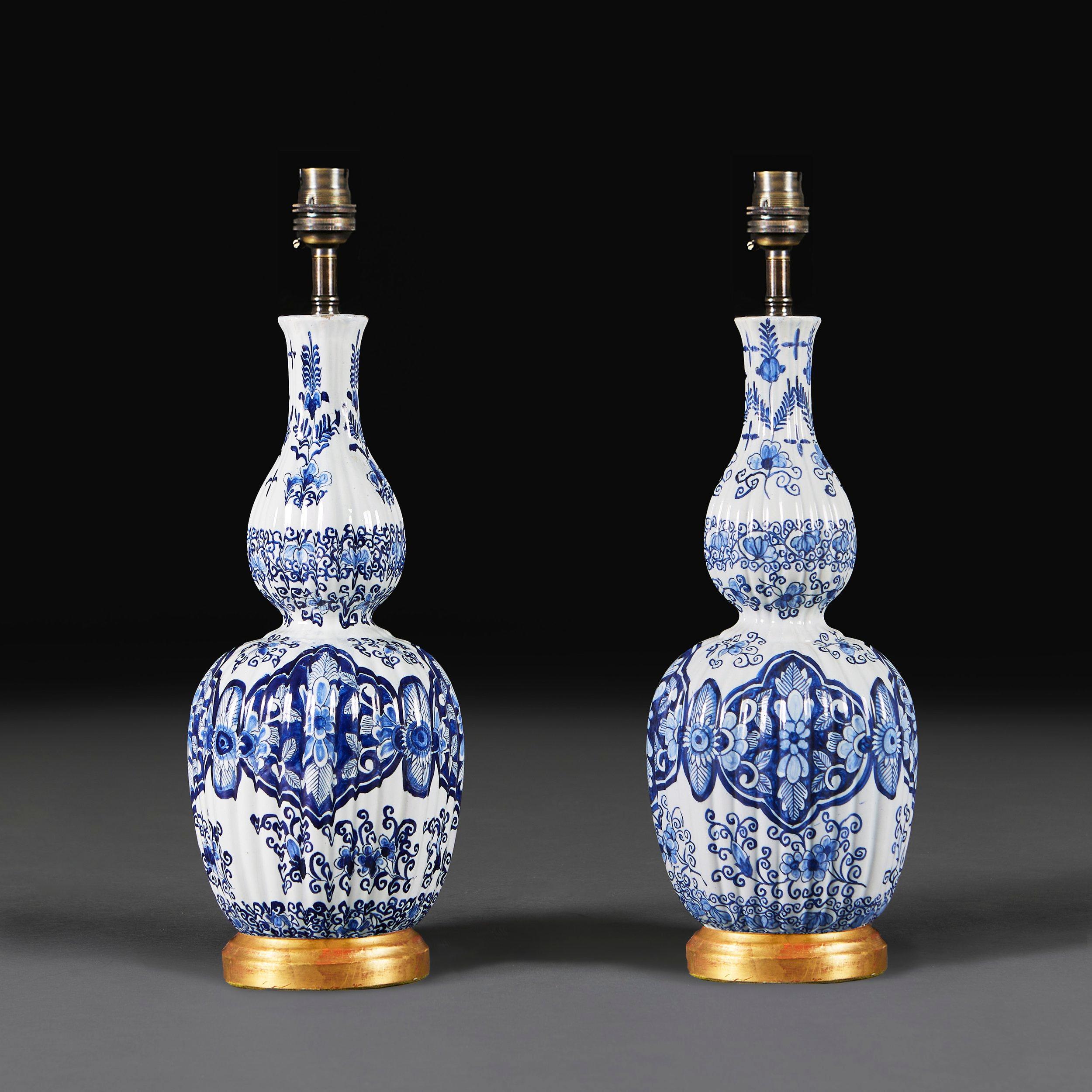 Dutch A Pair of 19th Century Blue and White Delft Lamps