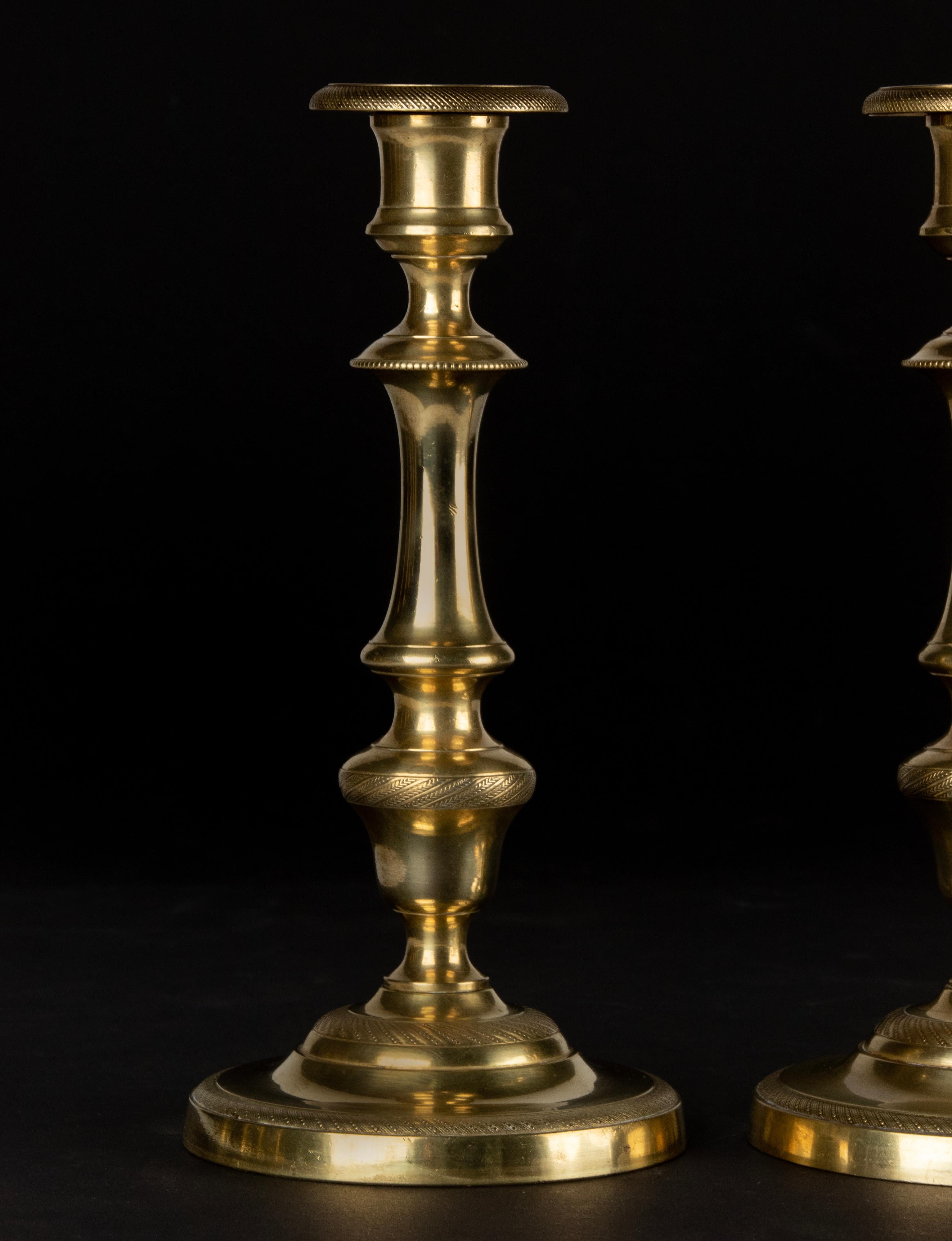 Hand-Crafted A Pair of 19th Century Brass Louis XVI Style Candlesticks