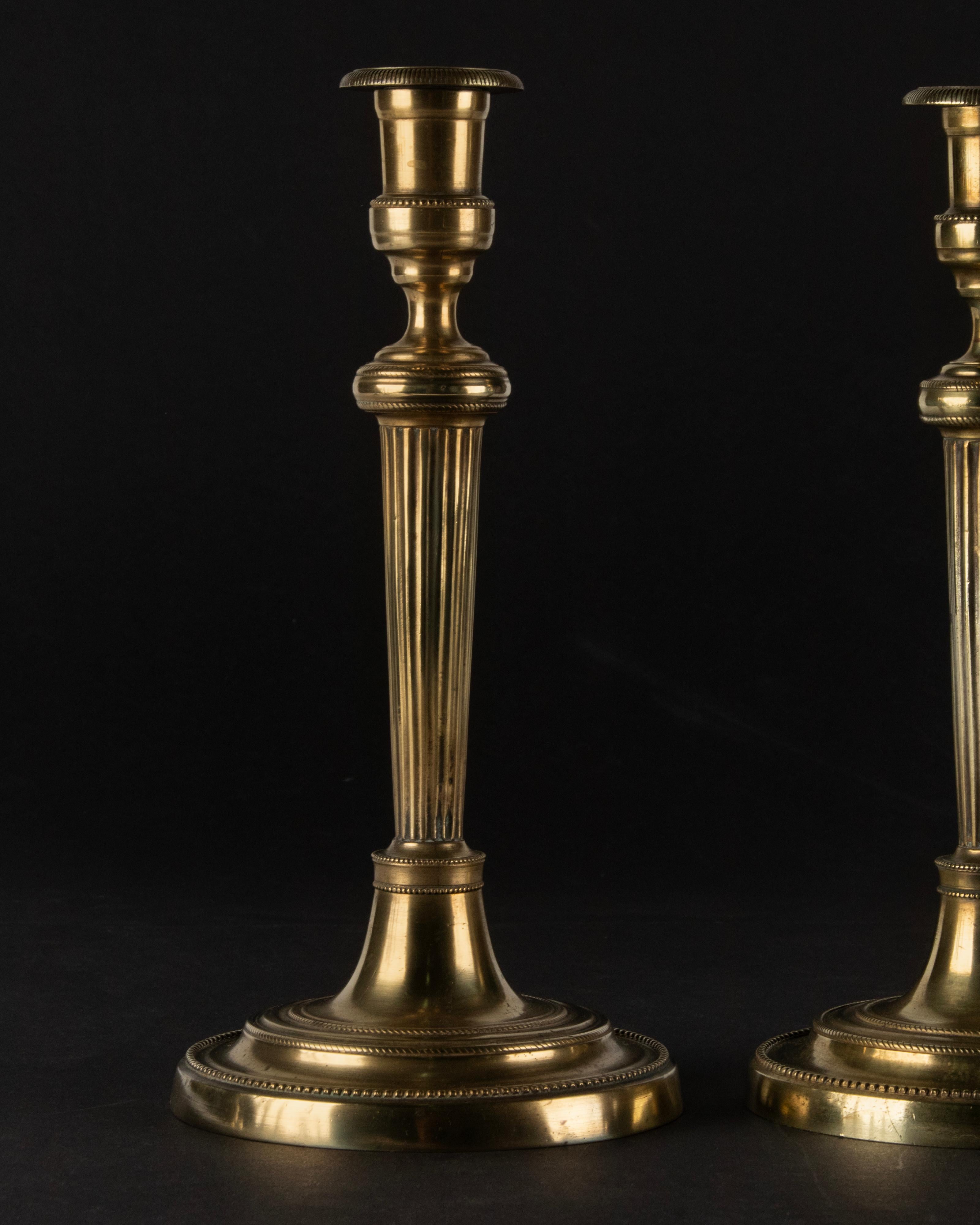 Late 19th Century A Pair of 19th Century Brass Louis XVI Style Candlesticks For Sale