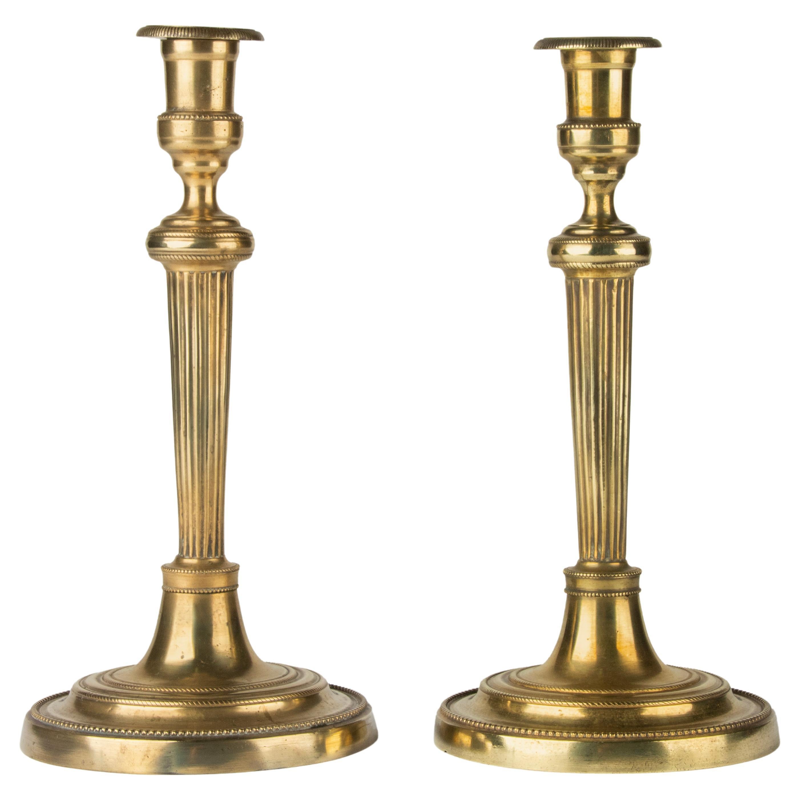 A Pair of 19th Century Brass Louis XVI Style Candlesticks