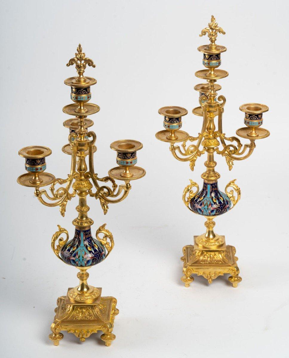 A pair of 19th century bronze and cloisonne candelabras 
Louis XV style, Napoleon III period
end of 19th century
in perfect condition
Measures: Width : 19 cm
Height : 43 cm.