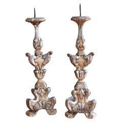 A pair of 19th century carved and gilded Italian torcheres