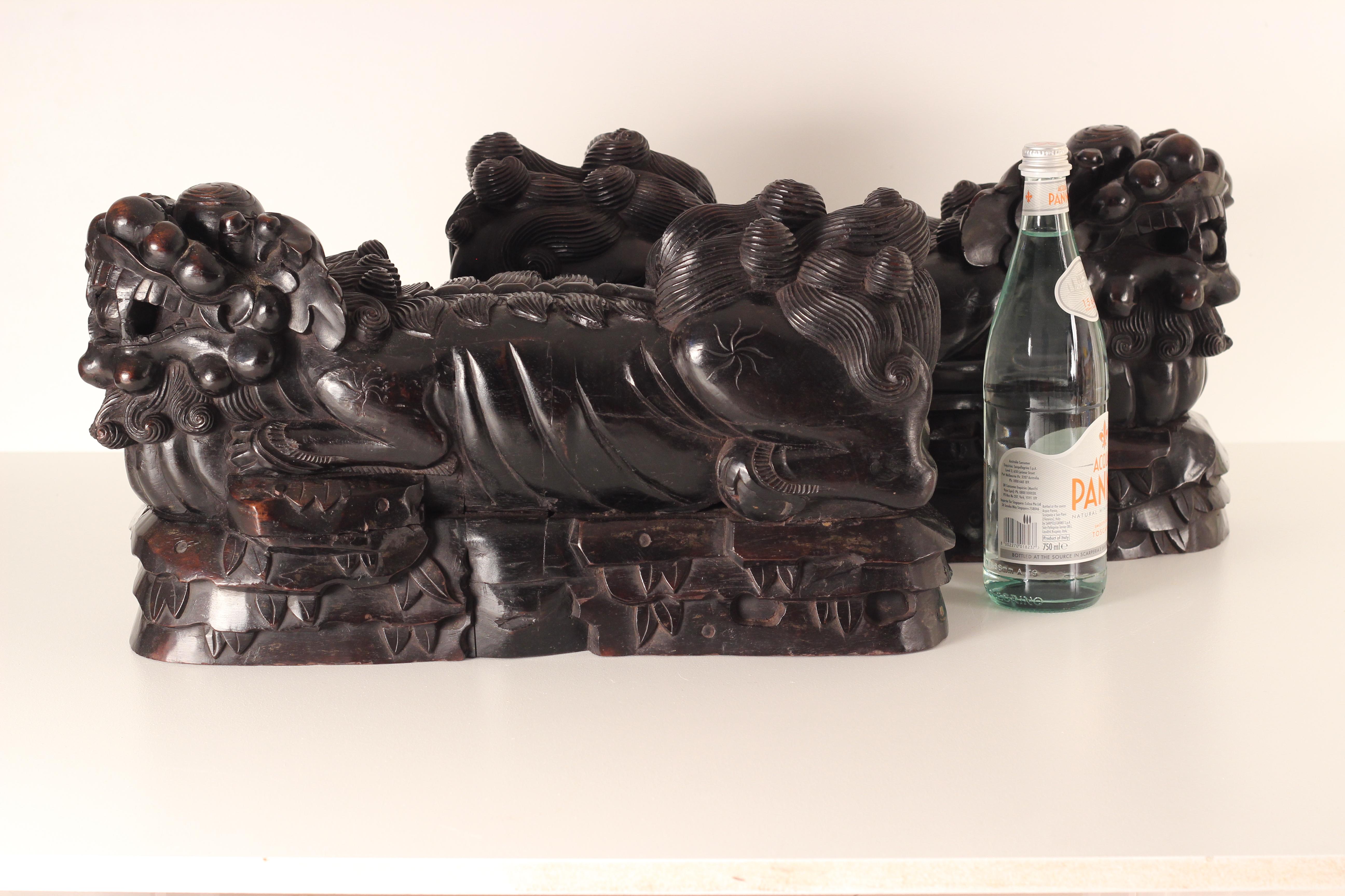 A pair of 19th Century carved Foo temple dogs or Chinese guardian Lions For Sale 4