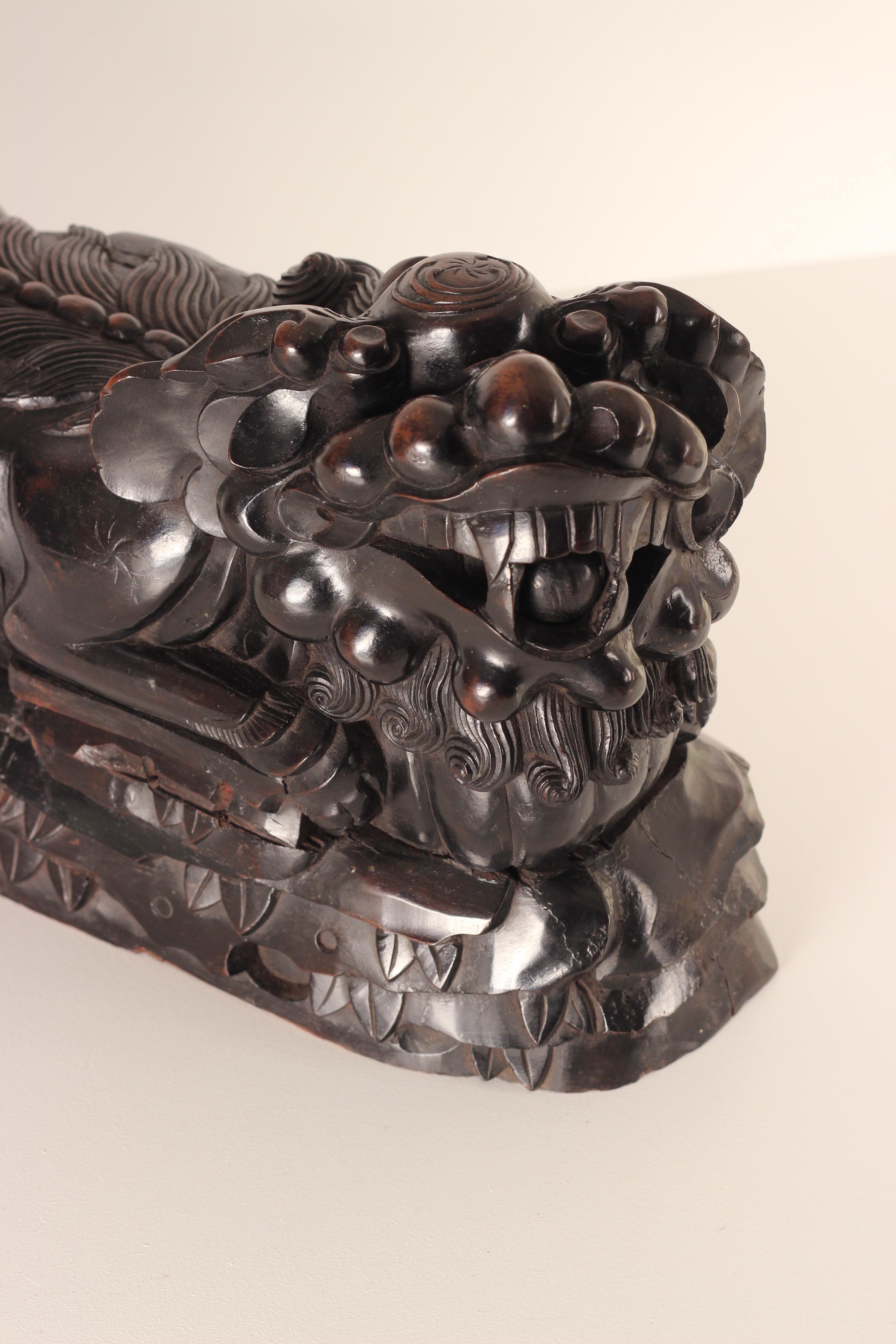 A pair of 19th Century carved Foo temple dogs or Chinese guardian Lions For Sale 1