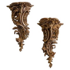 A Pair of 19th Century Carved Giltwood Rococo Wall Brackets