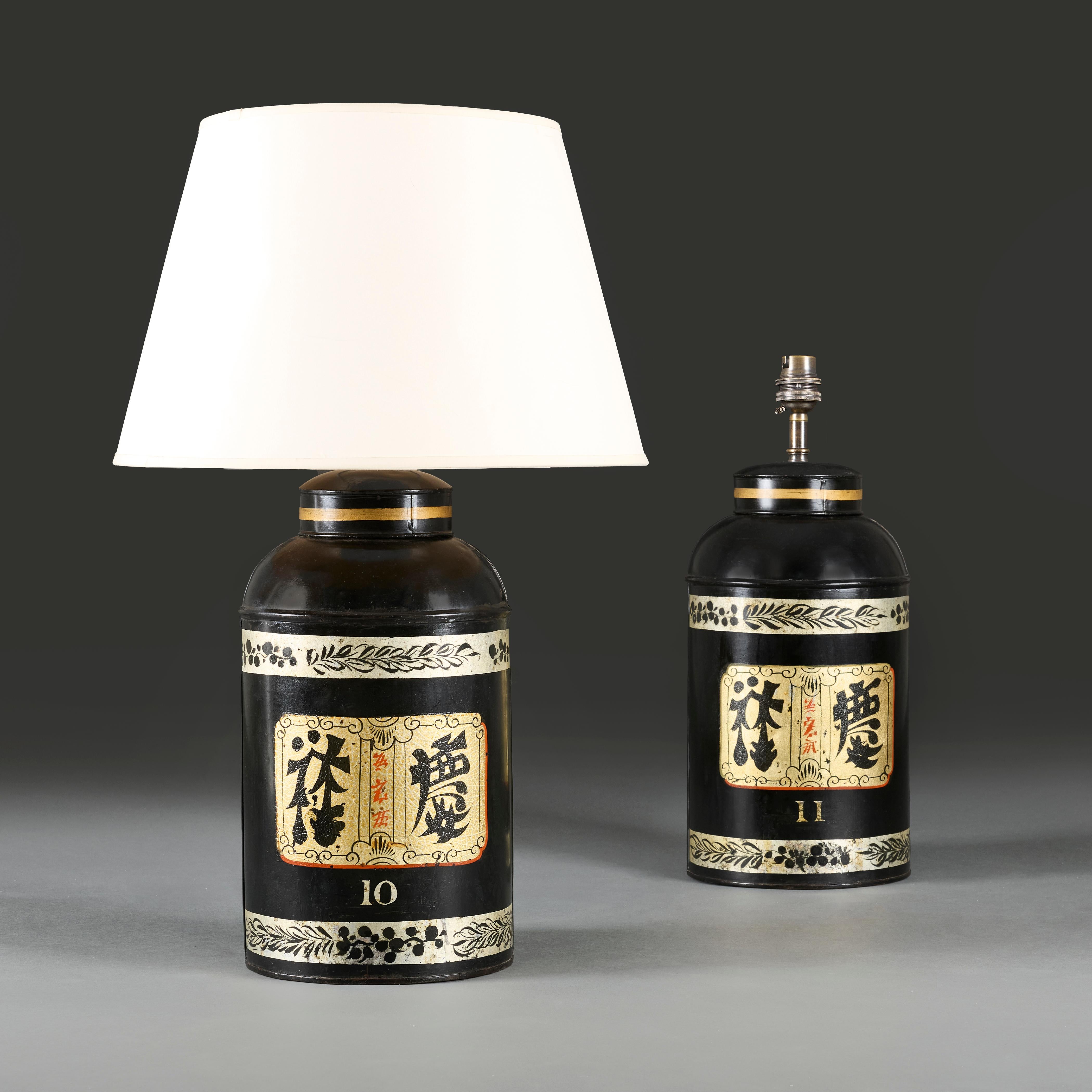 China, circa 1890
A pair of late nineteenth century black and gold tea canisters, with calligraphic cartouches to the fronts, one marked 10 and the other 11. Now converted as lamps.

Height of canister        42.00cm
Height with shade      