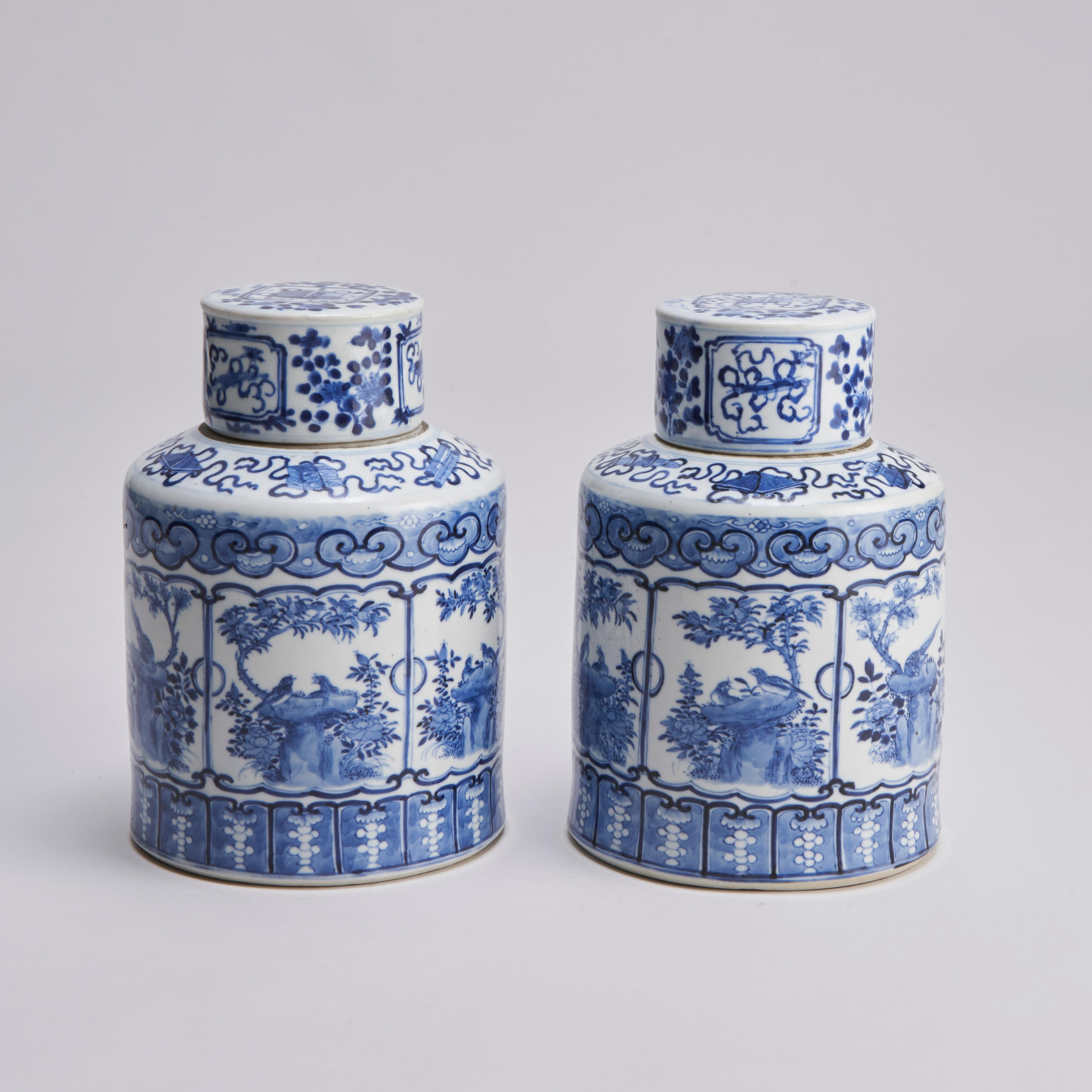From our collection of 19th Century Chinese Blue and white export porcelain, this pair of circular cannisters and covers with finely painted panels of birds on their nests with a Ruyi border and decoration of the eight treasure items to the