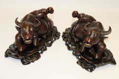 Pair of 19th Century Chinese Hardwood Water Buffalo on Stands, circa 1880