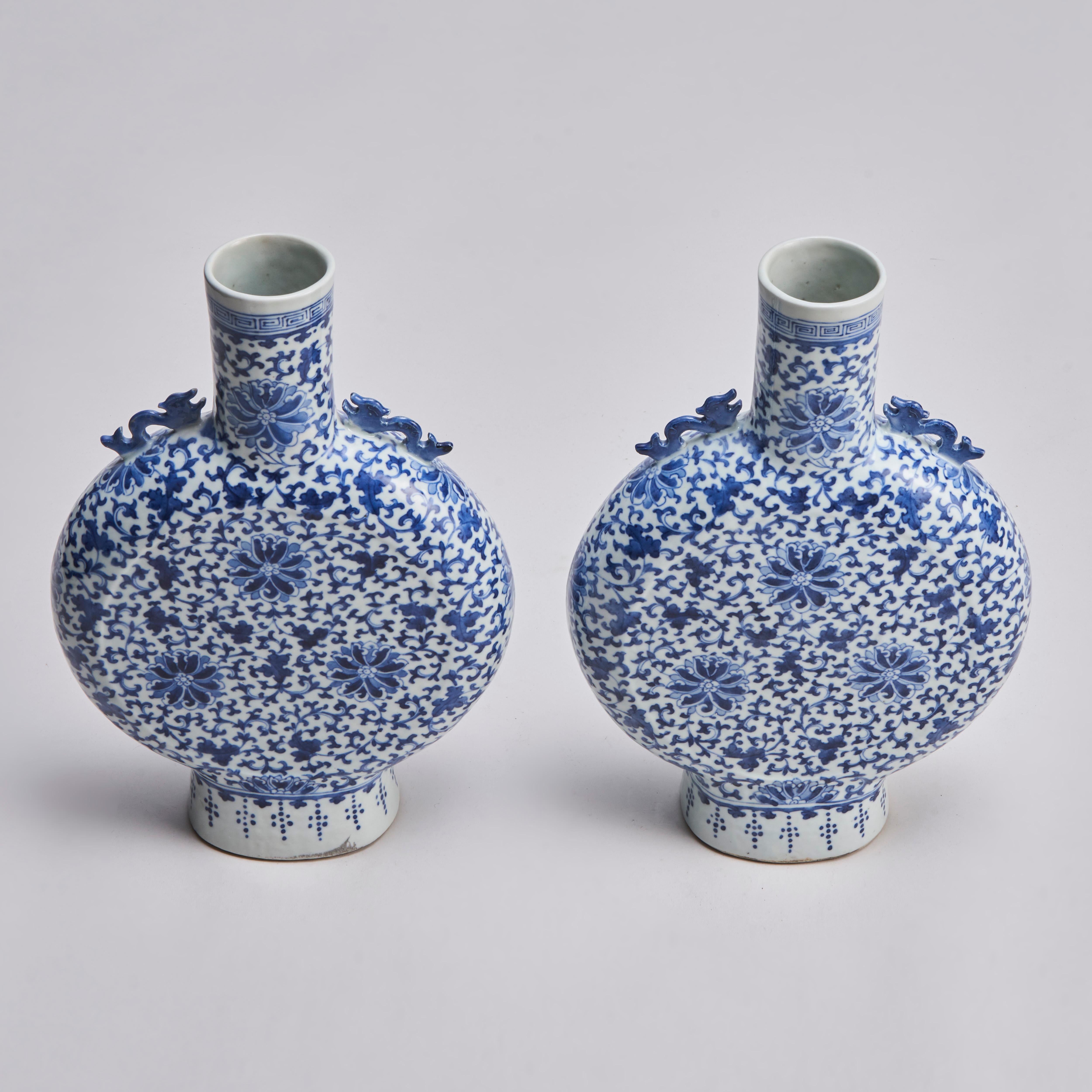Porcelain A pair of 19th Century, Chinese porcelain blue and white pilgrim vases For Sale