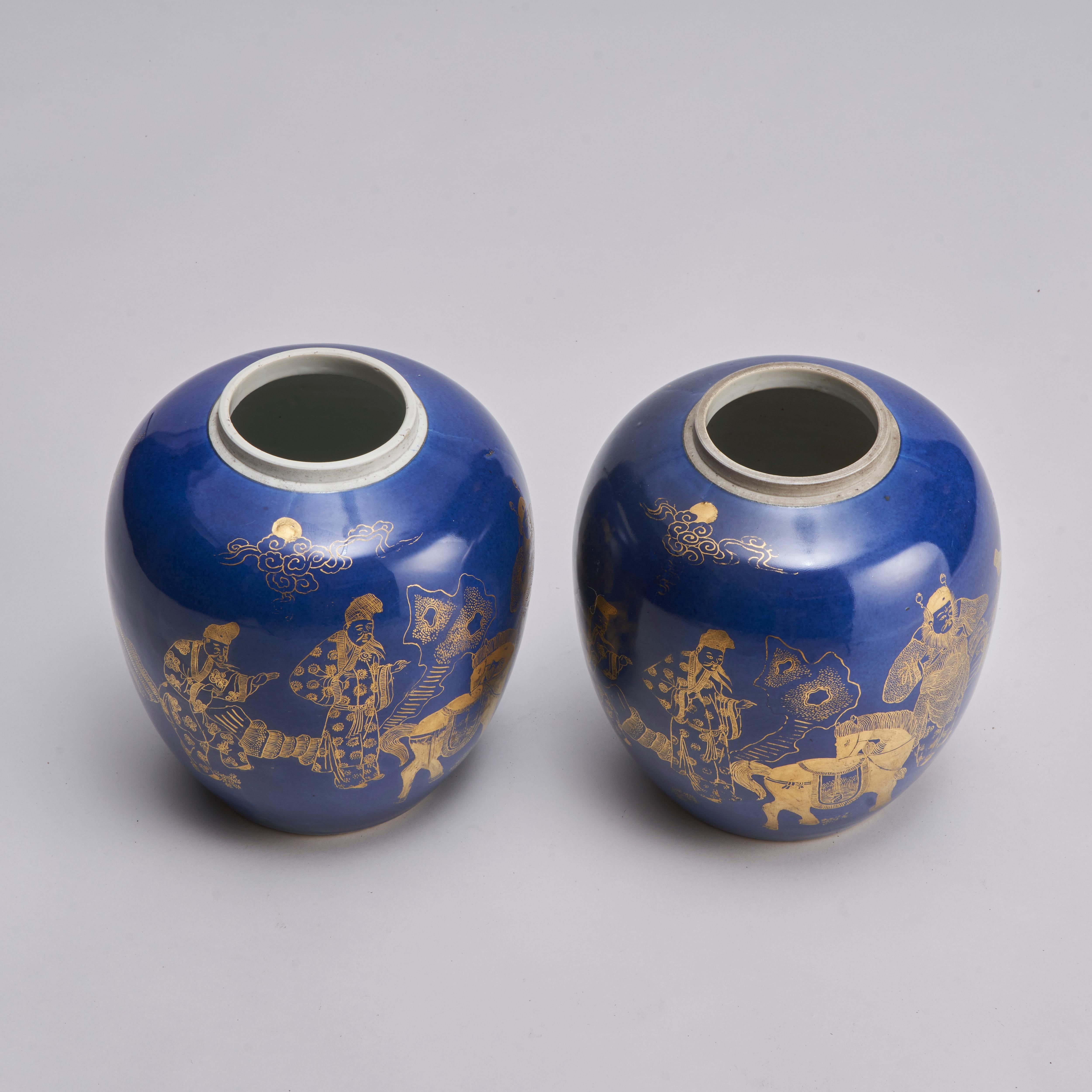 A pair of 19th century Chinese powder blue ginger jars. Both with gold decoration depicting three Scholars consulting a general, likely Guan Yu, seen here with his horse Red Hare.They stand in and ornamental rock garden under full moonlight. Contact