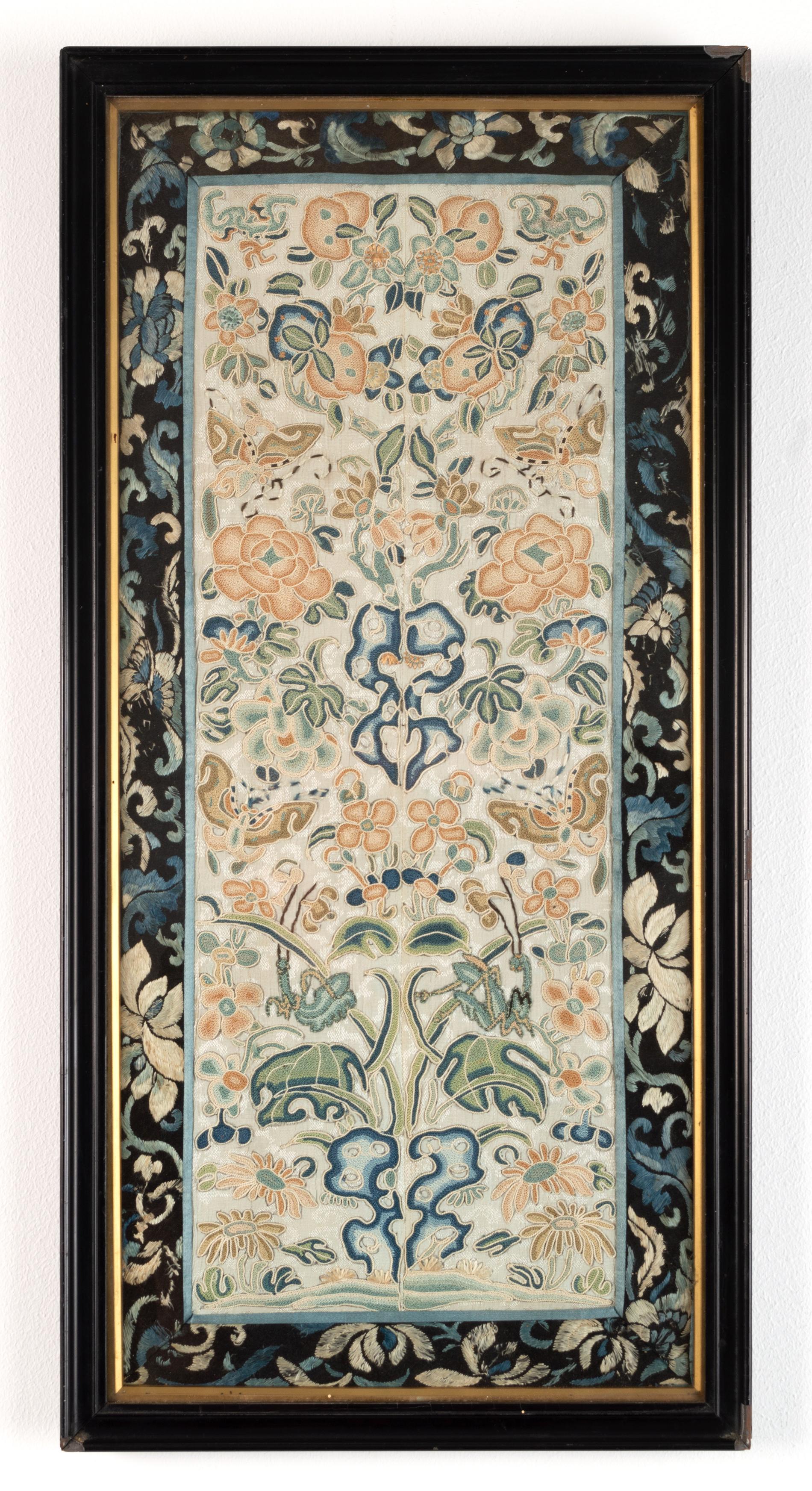 A Pair Of Chinese Embroidered Sleeve Panels. 
China, 19th Century, Qing Dynasty.

Antique textile ff rectangular form, with a central seam, one decorated with a floral design, worked in Pekin knot stitch, surrounded by a border featuring a