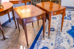 A pair of 19th century English mahogany pembroke side tables. Fine pair .