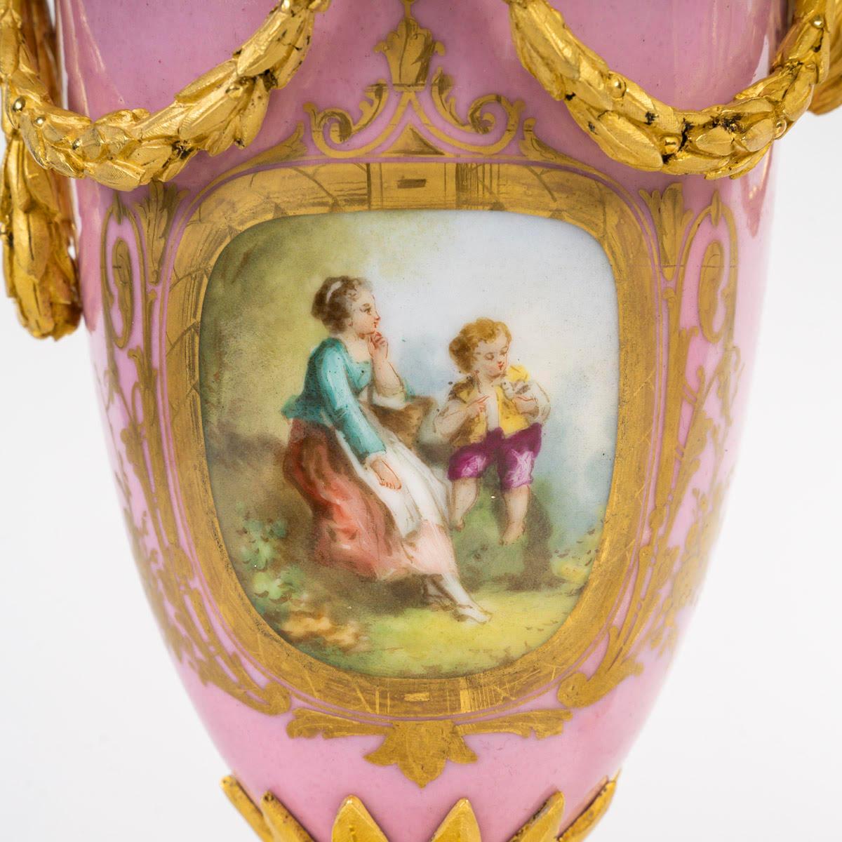 Napoleon III A Pair of 19th Century Ewers in Sèvres Porcelain and Gilt Bronze.