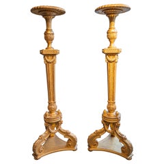 A pair of 19th century George 111 gilt pedestals