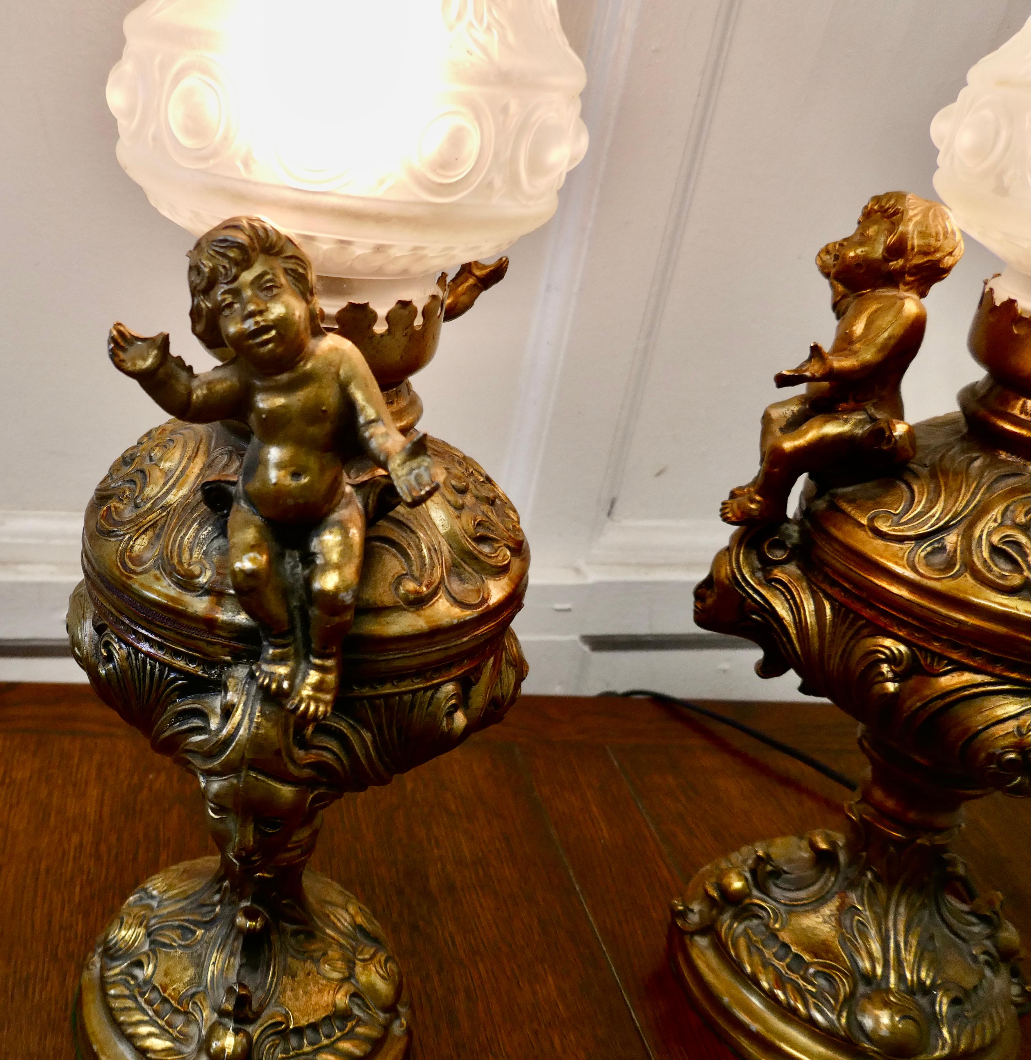 Pair of 19th Century Gilt Lamps in the Form of Cherubs or Putti In Good Condition In Chillerton, Isle of Wight