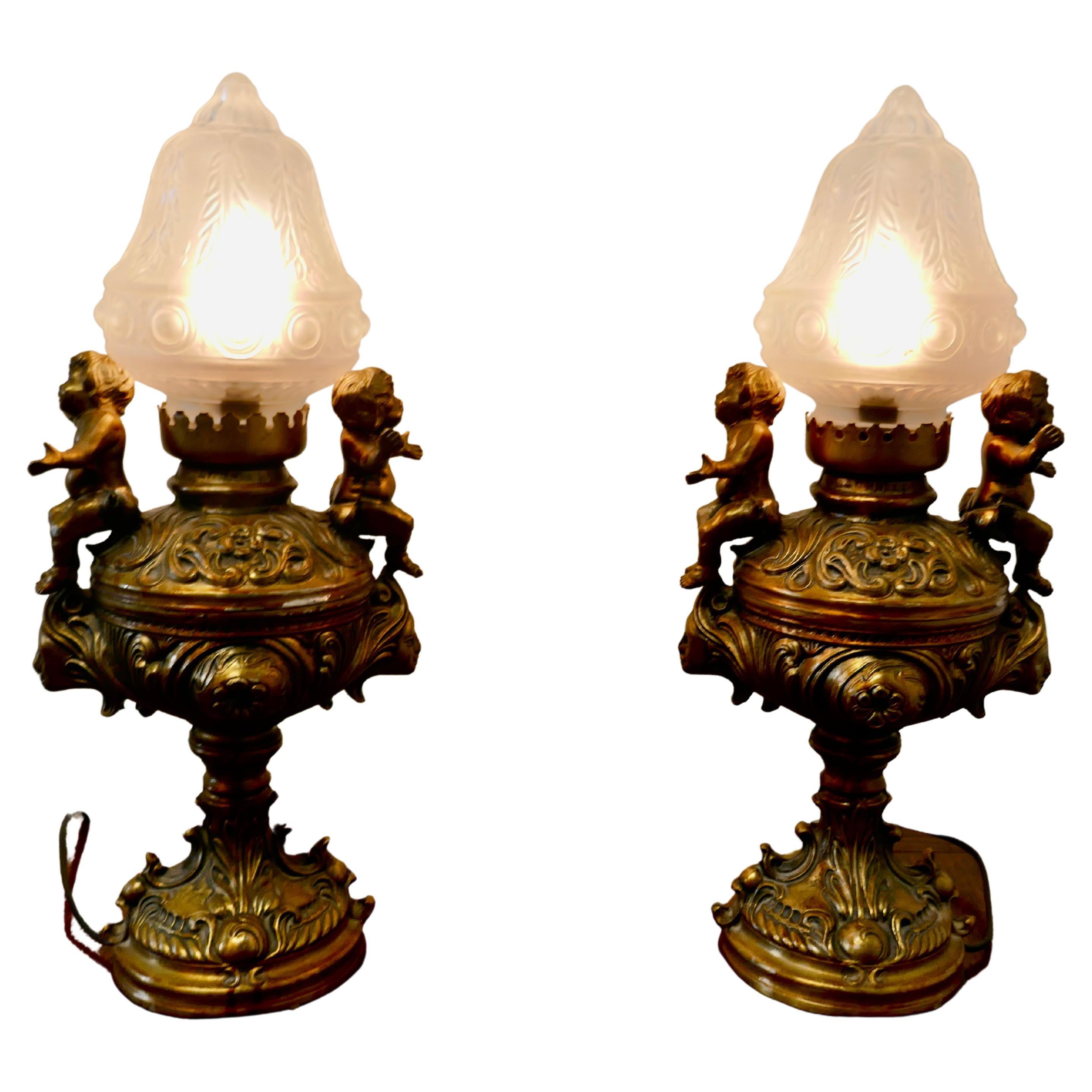 Pair of 19th Century Gilt Lamps in the Form of Cherubs or Putti