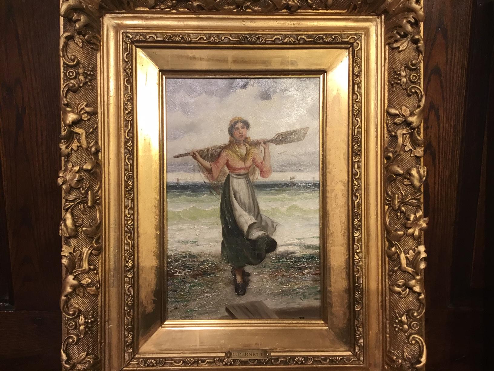 A pair of 19th century oil paintings by L. Pernett depicting a Breton fisherman and fisherwoman, housed in their original finely carved giltwood frames, titled en verso and with monogram. French circa 1890-1900

Dimensions: Frames 20