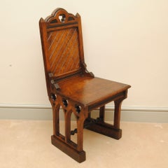 Pair of 19th Century Gothic Design Pitch Pine Hall Chairs