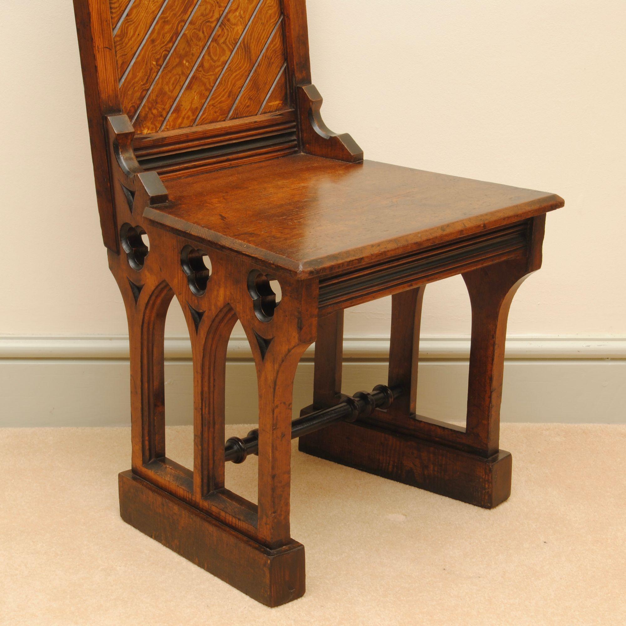 Carved Pair of 19th Century Gothic Design Pitch Pine Hall Chairs For Sale