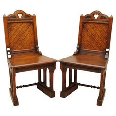 Pair of 19th Century Gothic Design Pitch Pine Hall Chairs