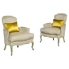 A Pair of 19th Century Green and Cream Painted Bergere Armchairs