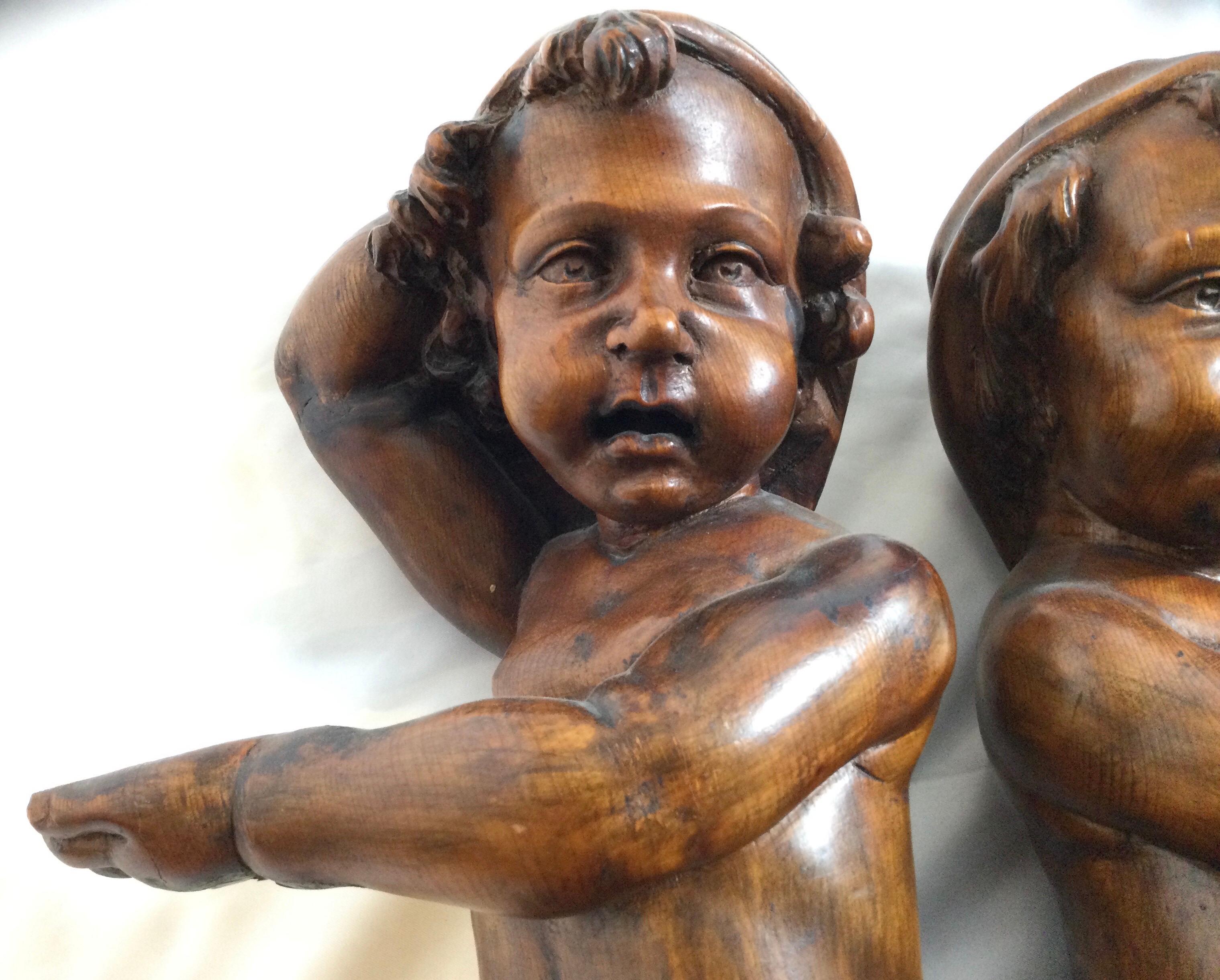 Late 19th Century Pair of 19th Century Hand Carved Italian Walnut Cherubs