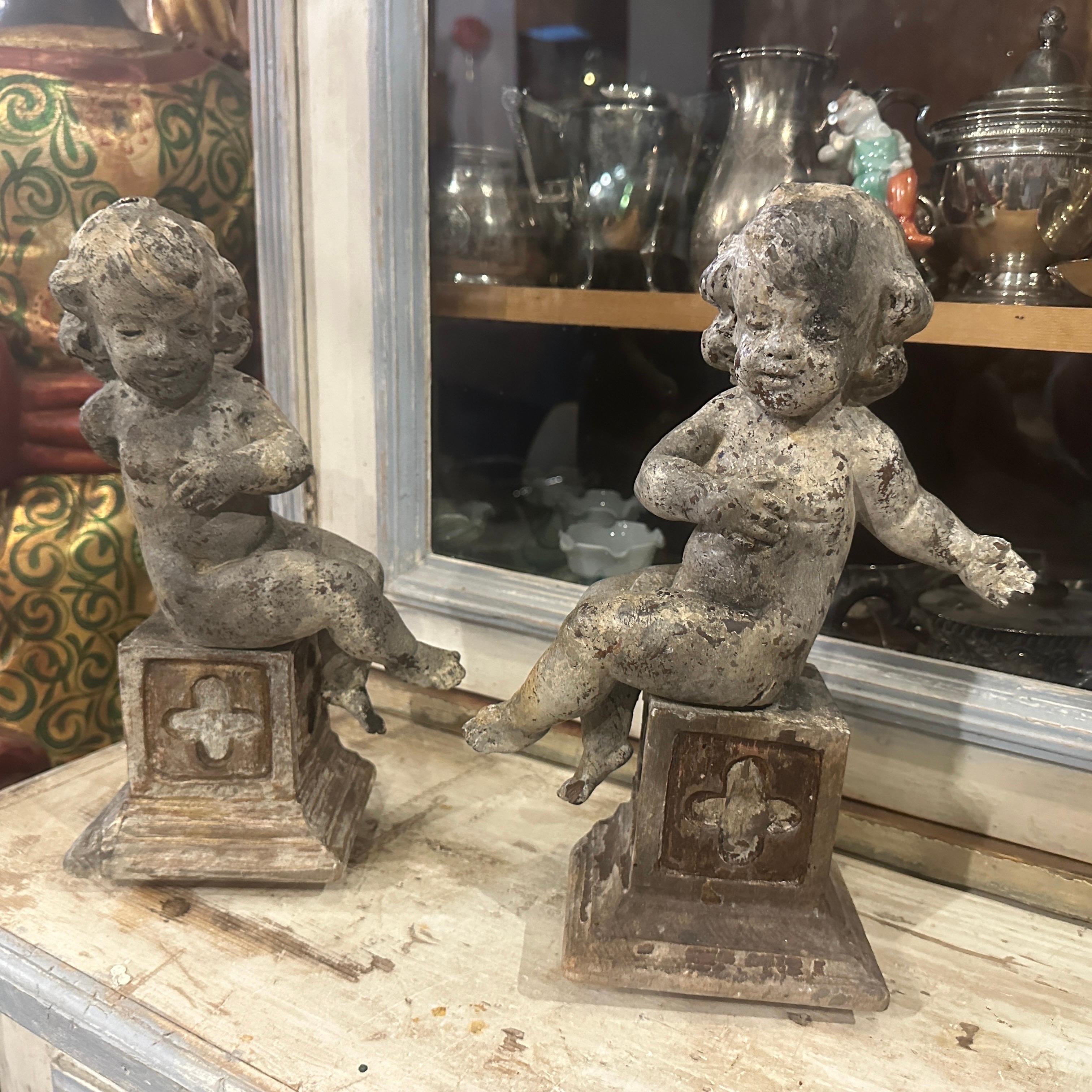 A pair of  19th Century Italian Wooden Putti Mounted on 18th Century Bases 5