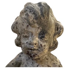 A pair of  19th Century Italian Wooden Putti Mounted on 18th Century Bases