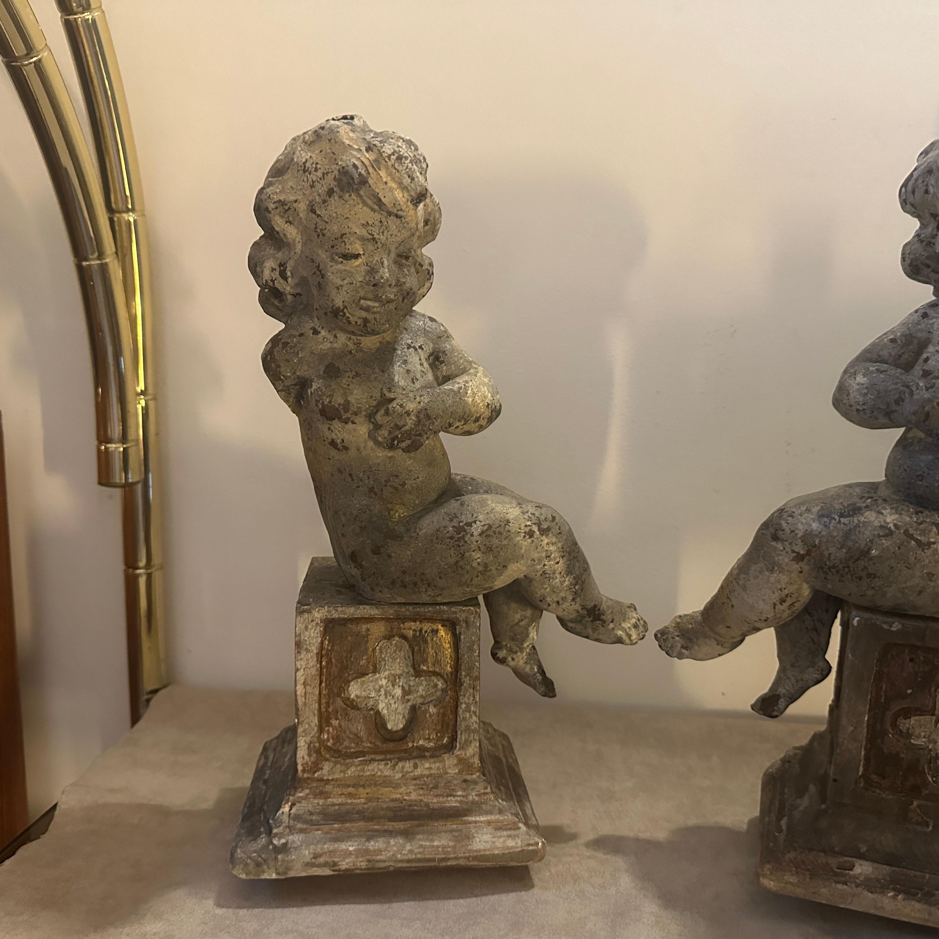 Hand-Carved A pair of  19th Century Italian Wooden Putti Mounted on 18th Century Bases