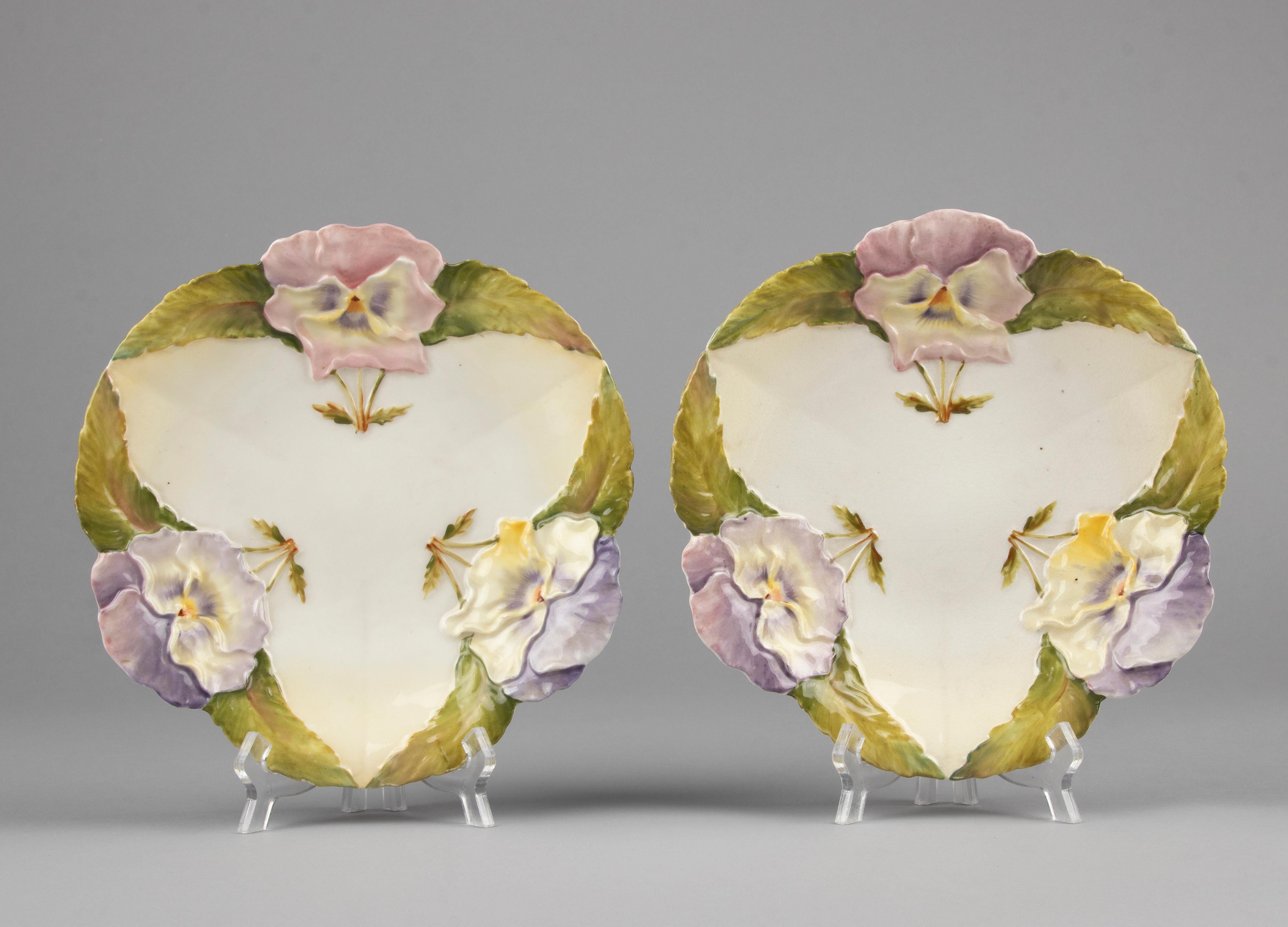 A lovely pair of 19th century Majolica plates. With great shape and striking colors. 
The plates are marked on the back with a blind mark, but this is not legible. 
The plates are in good condition. No chips and nog hairlines.
  