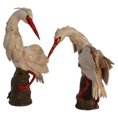 A pair of 19th century Meiji period Japanese hand made pottery storks, c 1900