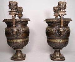 A Pair of 19th century Neoclassical Style Patinated Bronze Urns