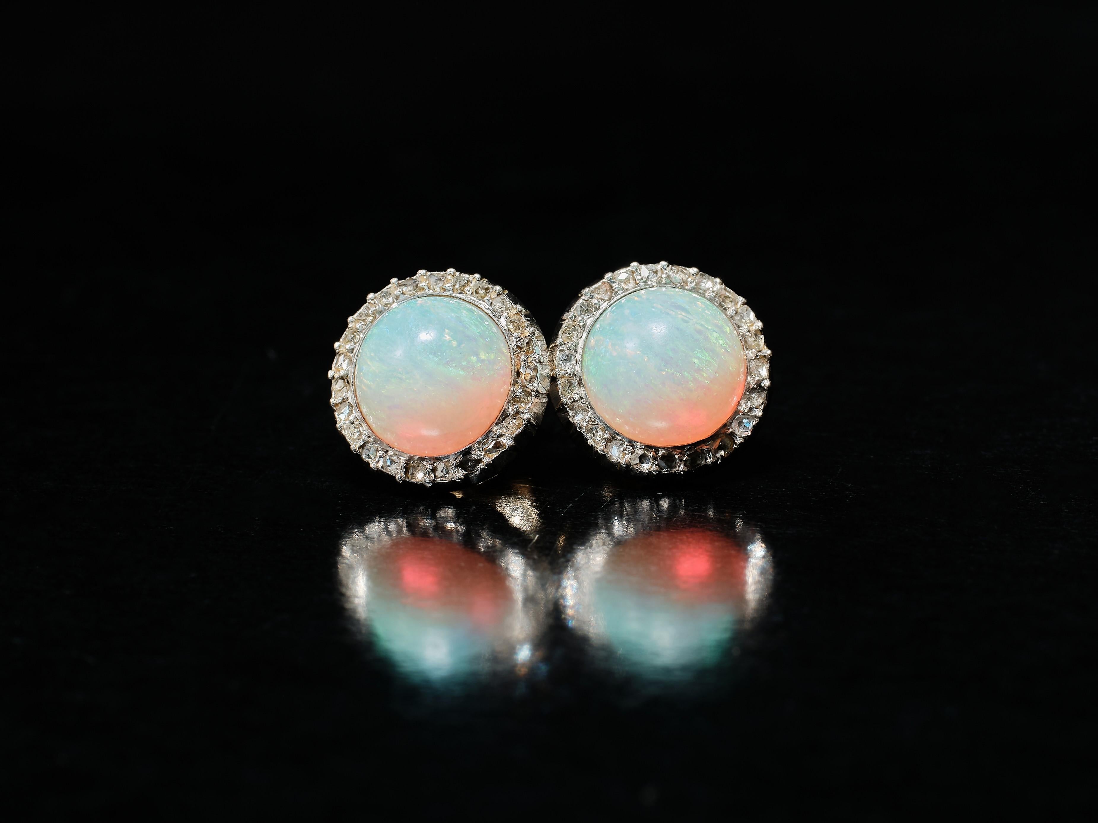 Late Victorian A pair of 19th century opal and diamond cluster earrings. Silver over gold. For Sale