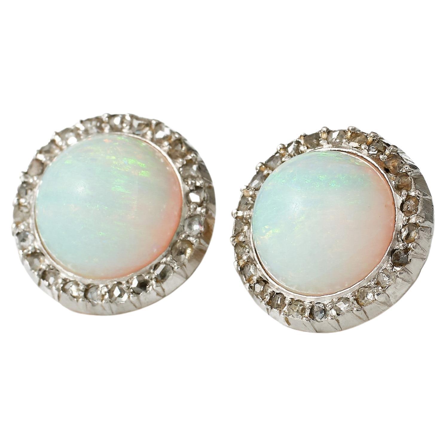 A pair of 19th century opal and diamond cluster earrings. Silver over gold. For Sale