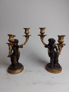 Pair of 19th Century Ormolu Candlestick Holders Held by Bronze Fawns/Cherubs